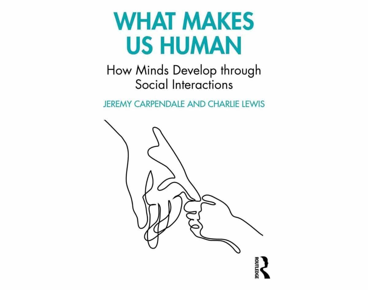 A book cover titled 'What Makes Us Human, How Minds Develop Through Social Interactions' by Jeremy Carpendale and Charlie Lewis