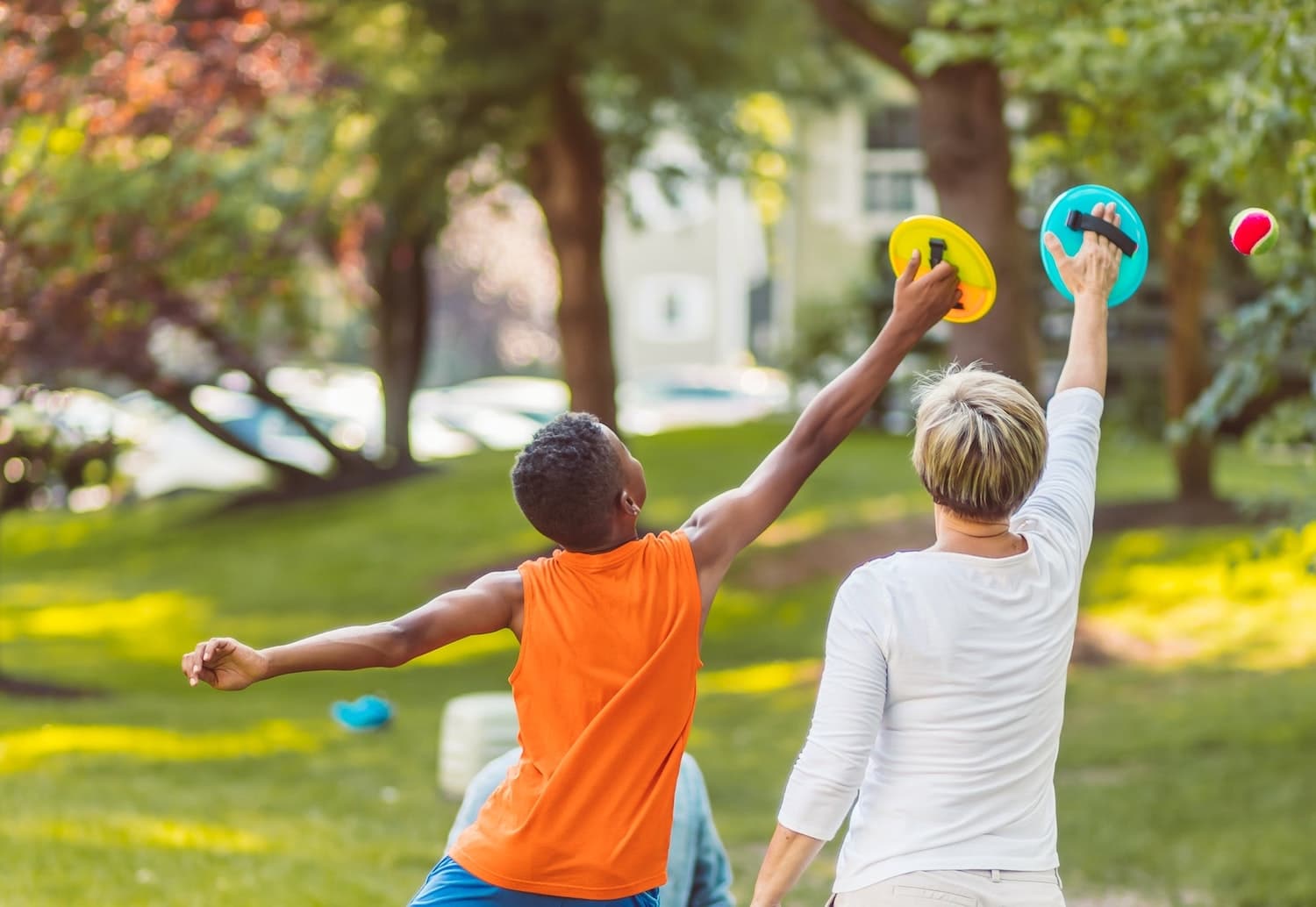 A family playing games outside.